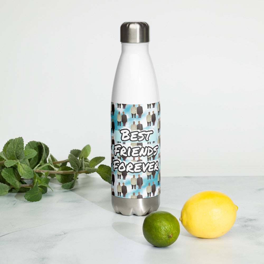 Silver water bottle with 'Best Friends Forever' label on a white surface with a lemon and lime.