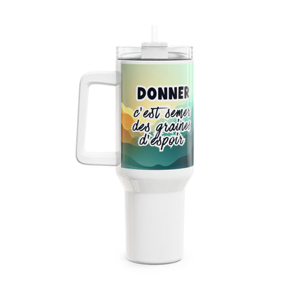 White travel mug with colorful design and text on a white background