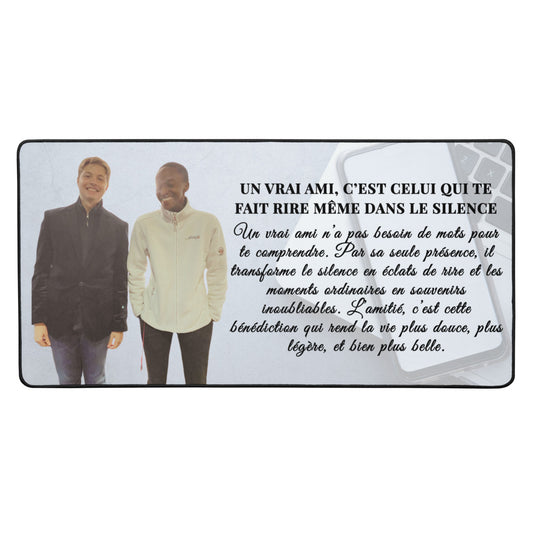 Desk Mat with Two people standing next to each other with a text overlay on a white background