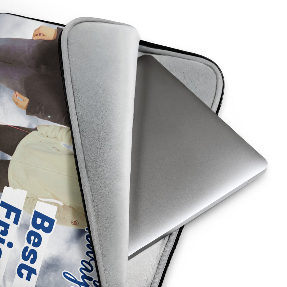 Gray laptop sleeve with a magazine or book on top